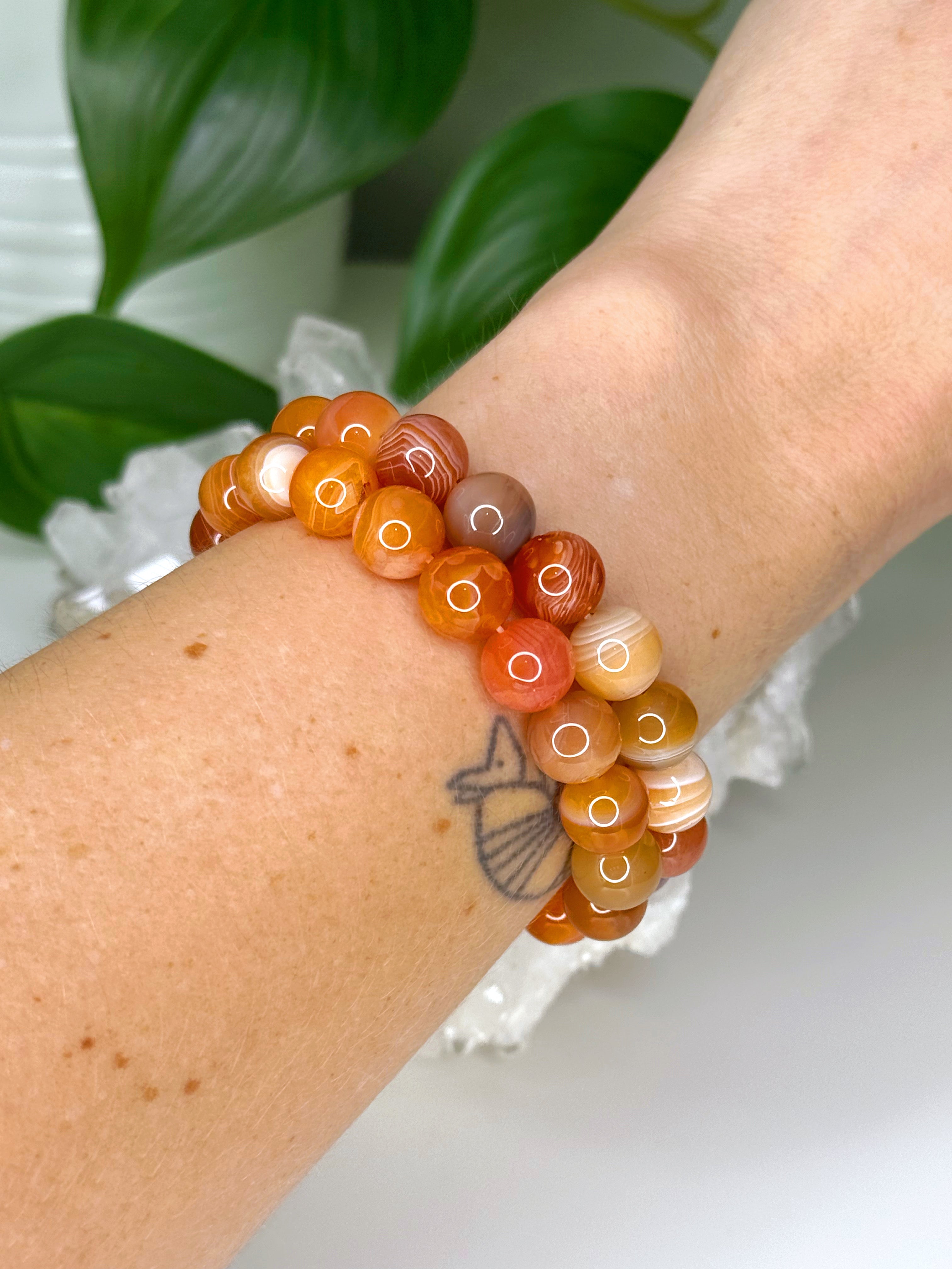 ORANGE/RED BOTSWANA AGATE 10mm - HANDMADE CRYSTAL BRACELET - 10mm, Botswana agate, bracelet, career, crystal bracelet, emotional support, fire, handmade bracelet, jewelry, market bracelet, mixed colors, Orange, orange Botswana agate, pink, red, red Botswana agate, summerween collection, Wearable - The Mineral Maven