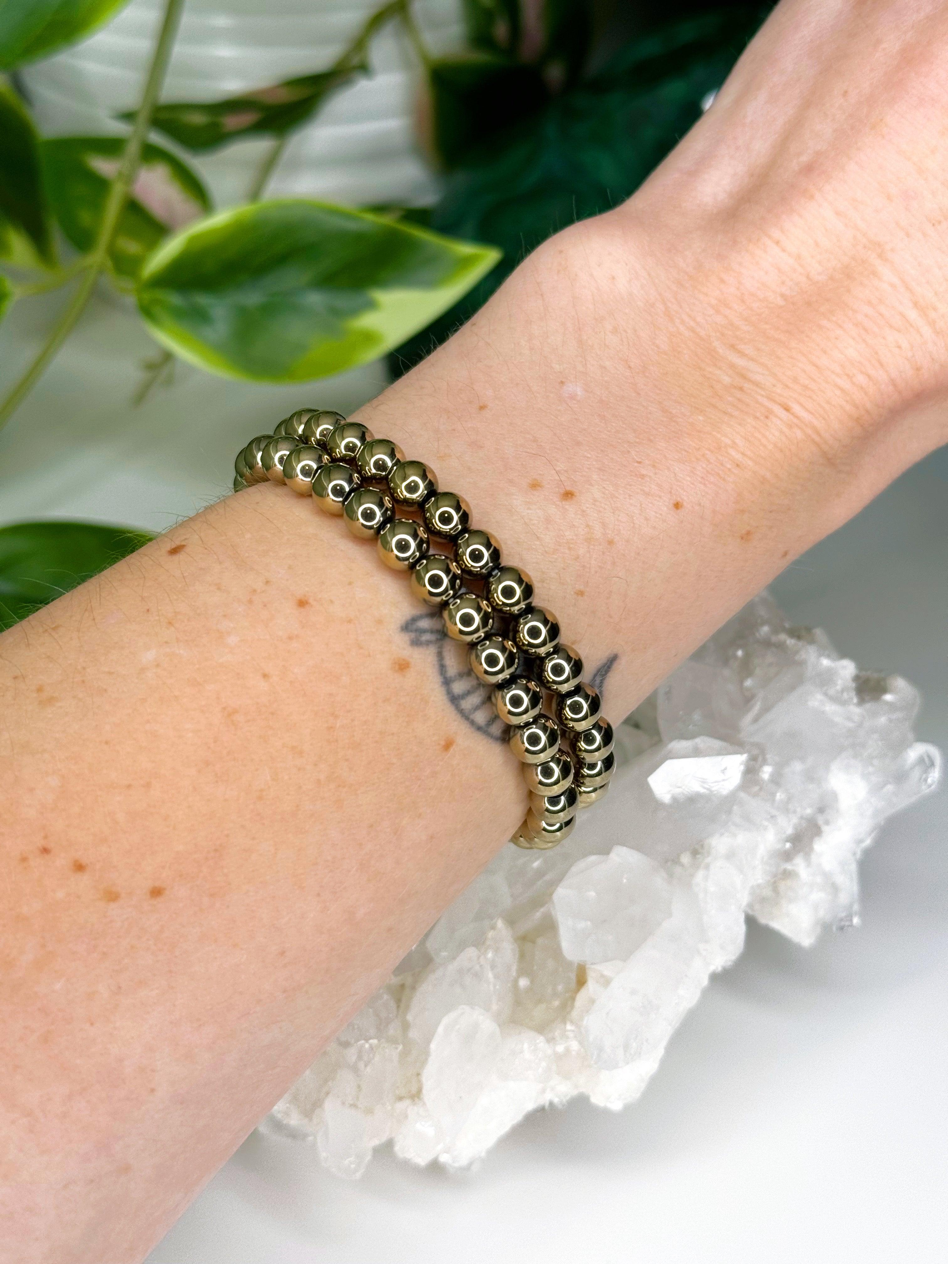 PYRITE 6mm - HANDMADE CRYSTAL BRACELET - 6mm, aries, bracelet, career, crystal bracelet, crystals for beginners, earth, fire, good luck + abundance, handmade bracelet, jewelry, June 2025 inventory check, leo, Leo szn, market bracelet, metallic, pyrite, Wearable - The Mineral Maven