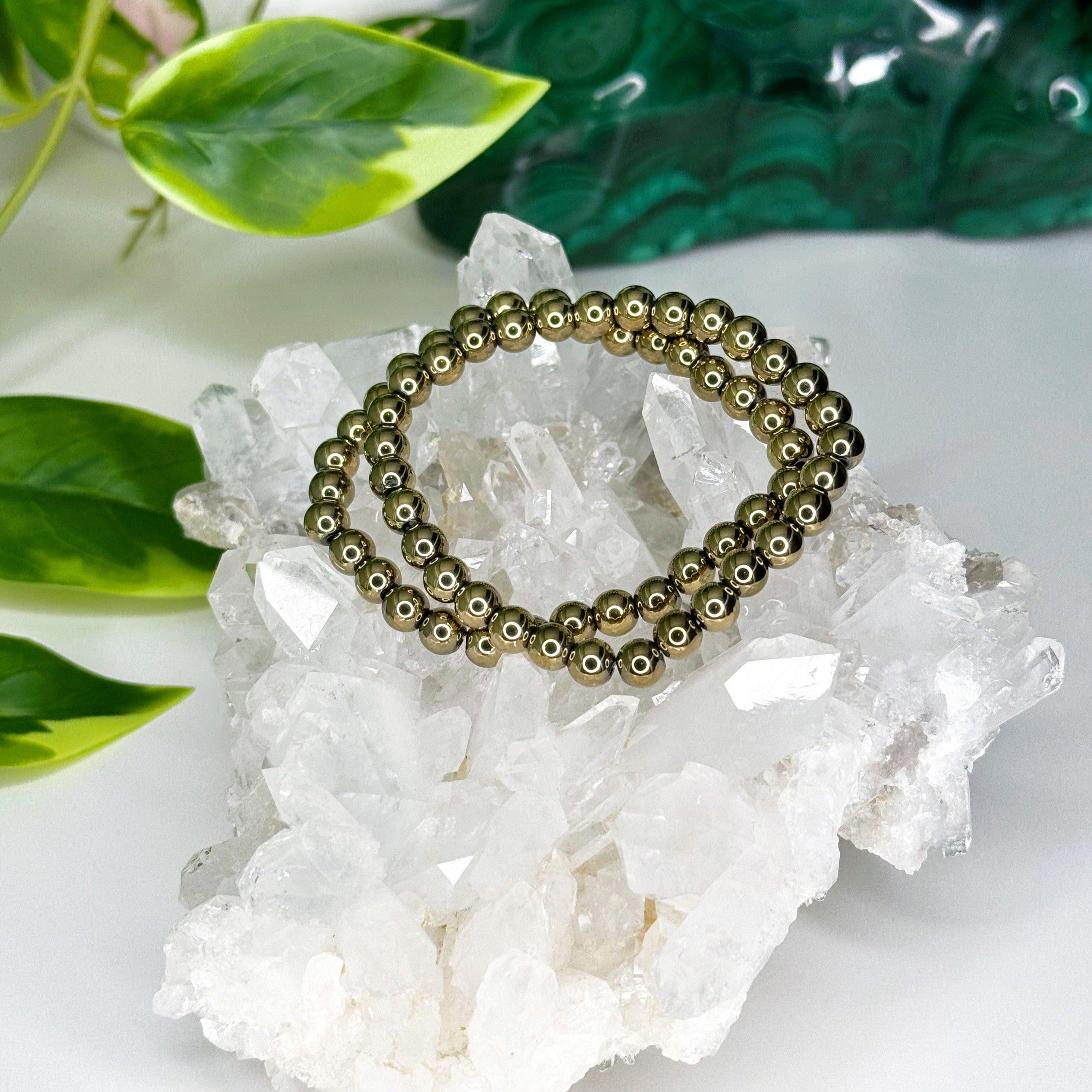 PYRITE 6mm - HANDMADE CRYSTAL BRACELET - 6mm, aries, bracelet, career, crystal bracelet, crystals for beginners, earth, fire, good luck + abundance, handmade bracelet, jewelry, June 2025 inventory check, leo, Leo szn, market bracelet, metallic, pyrite, Wearable - The Mineral Maven