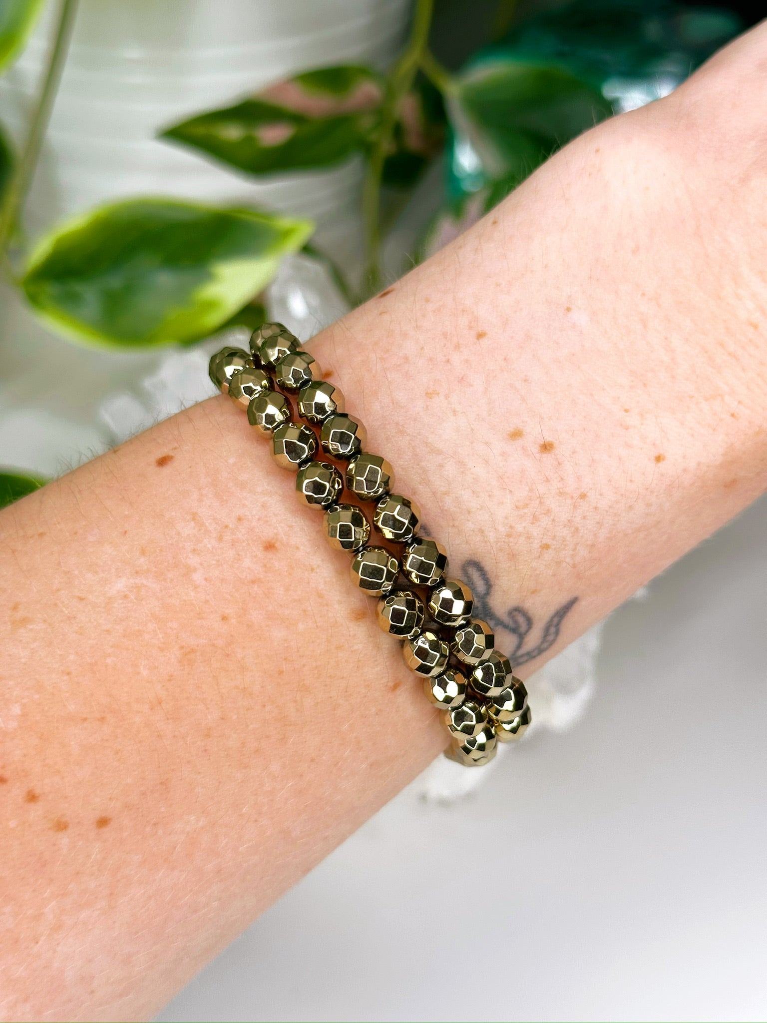 PYRITE (FACETED) 6mm - HANDMADE CRYSTAL BRACELET - 6mm, aries, bracelet, career, crystal bracelet, crystals for beginners, earth, faceted, fire, good luck + abundance, handmade bracelet, jewelry, June 2025 inventory check, leo, Leo szn, market bracelet, metallic, pyrite, Wearable - The Mineral Maven