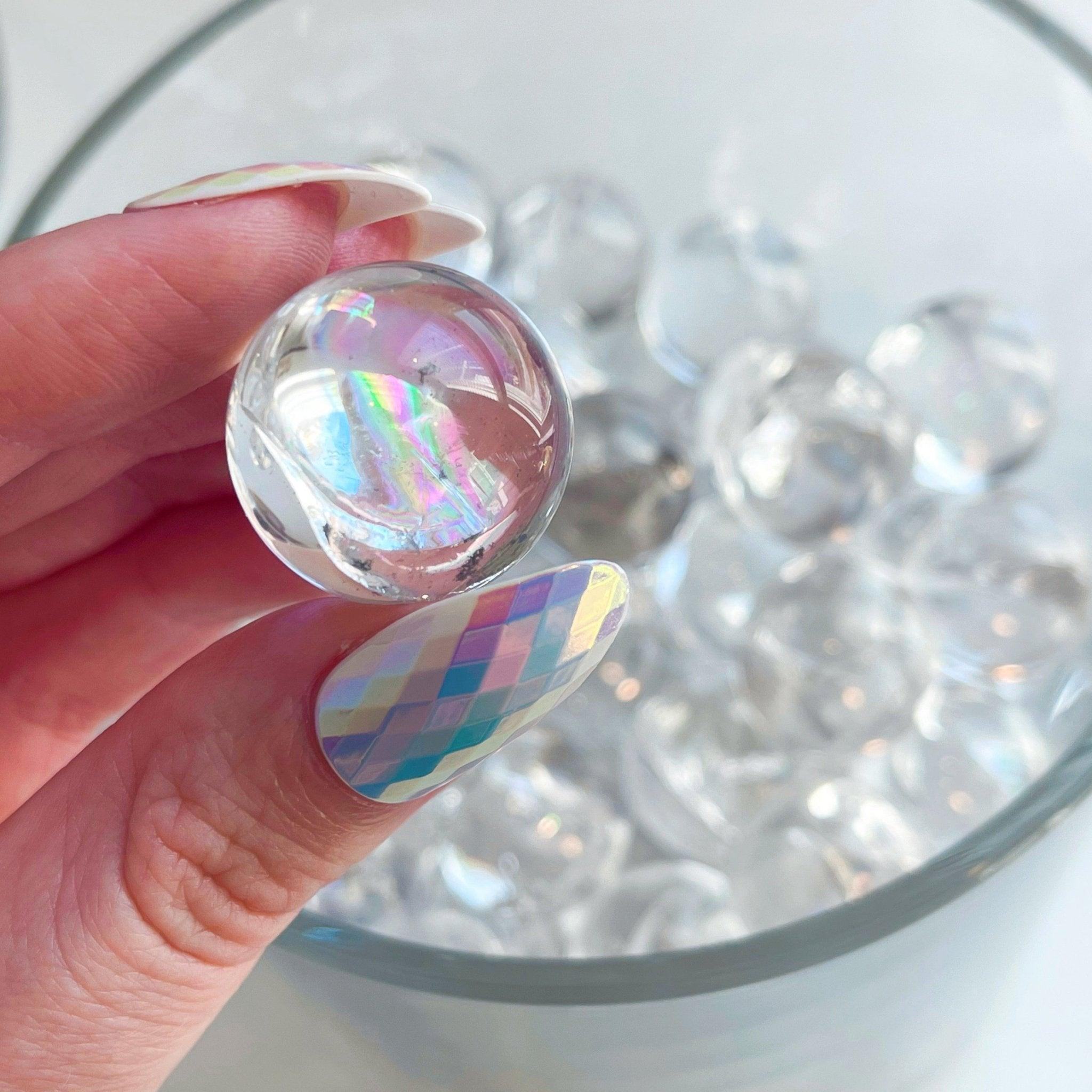 RAINBOW FILLED MINI QUARTZ SPHERE - 33 bday, 444 sale, birthday, clear quartz, end of year sale, flash sale, holiday sale, leo season, mini sphere, new year sale, pocket crystal, polished, quartz, rainbow, smoky, smoky quartz, smoky quartz sphere, sphere, spring equinox - The Mineral Maven