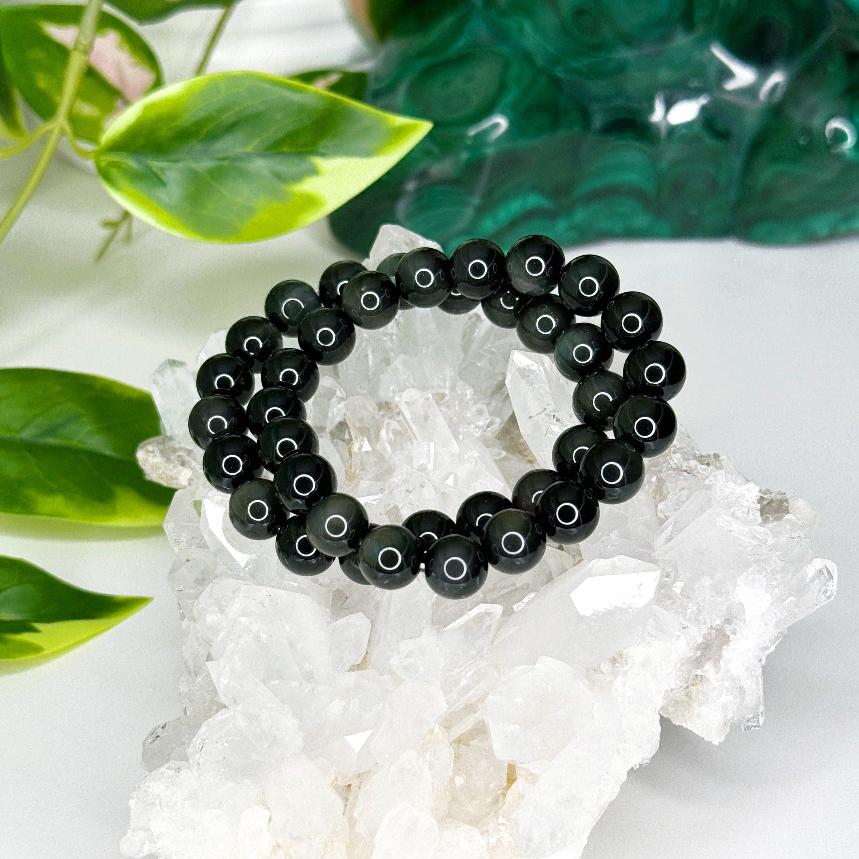 RAINBOW OBSIDIAN 10mm - HANDMADE CRYSTAL BRACELET - 10 Dec Inventory, 10mm, black, bracelet, bracelet inventory check, crystal bracelet, grief gift bundle, handmade bracelet, jewelry, June 2025 inventory check, market bracelet, obsidian, rainbow obsidian, scorpio, scorpio stack, solstice collection, virgo, virgo stack, Wearable, winter solstice collection - The Mineral Maven