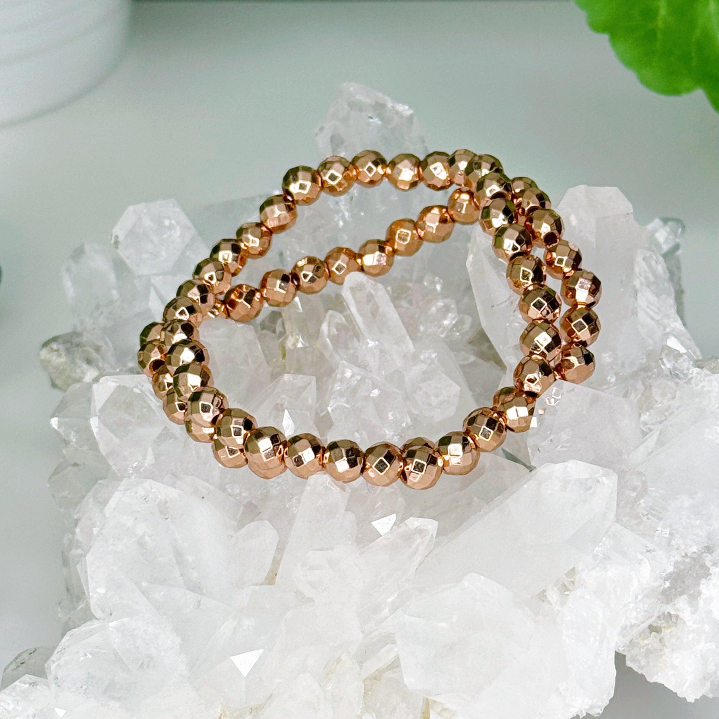 ROSE GOLD TITANIUM COATED HEMATITE (FACETED) 6mm - HANDMADE CRYSTAL BRACELET - 10 Dec Inventory, 6mm, bracelet, bracelet inventory check, crystal bracelet, faceted, handmade bracelet, hematite, jewelry, June 2025 inventory check, rose gold, titanium coated, valentines bracelets, valentines vibes, Wearable - The Mineral Maven