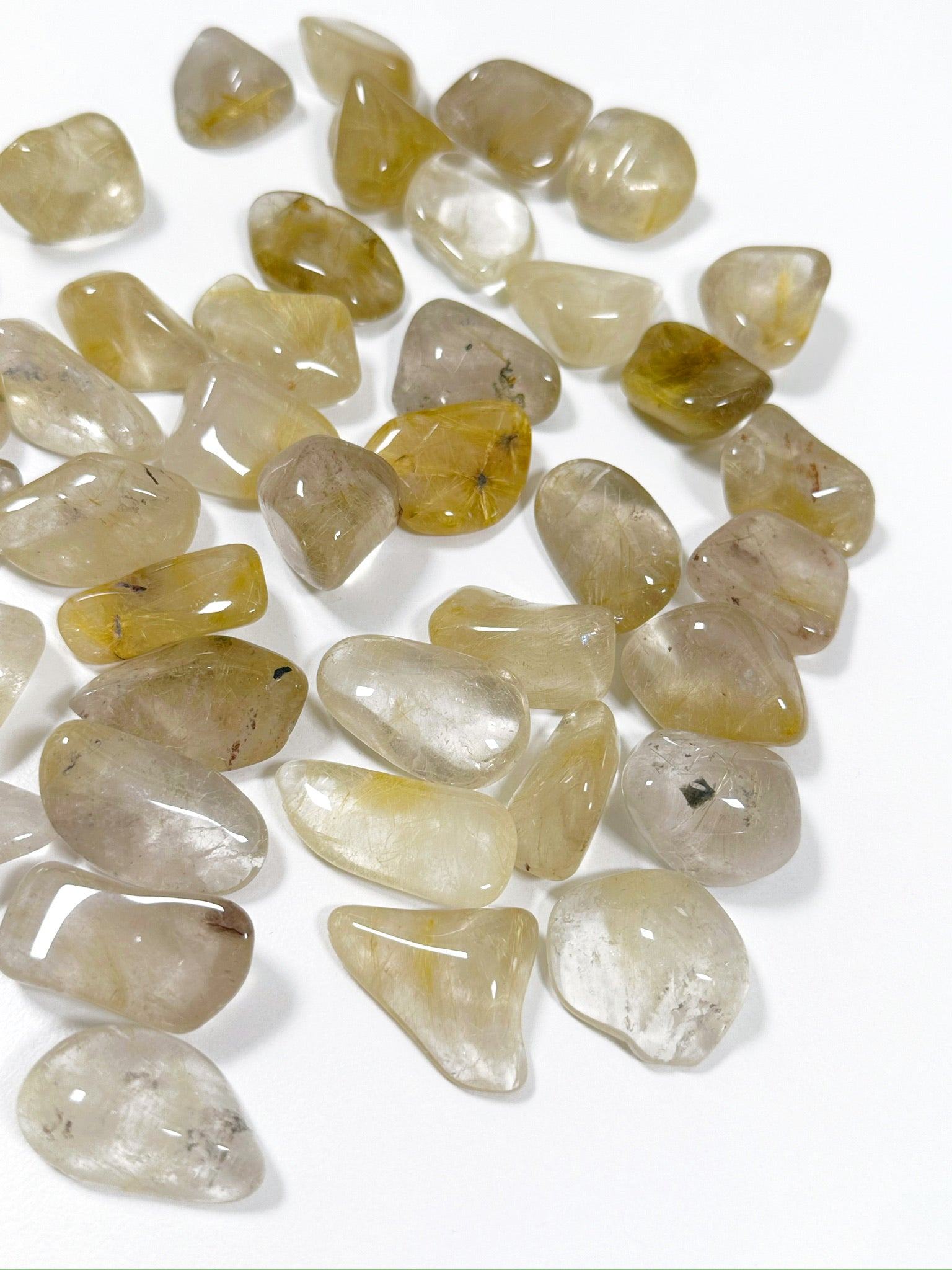 RUTILATED QUARTZ TUMBLE - 2025 vibes, 33 bday, Black Friday sale, emotional support, end of year sale, focus gift bundle, golden rutilated quartz, holiday sale, pocket crystal, pocket crystals, pocket stone, quartz, rutilated quartz, tumble, tumbled, tumbled stone, tumbles - The Mineral Maven