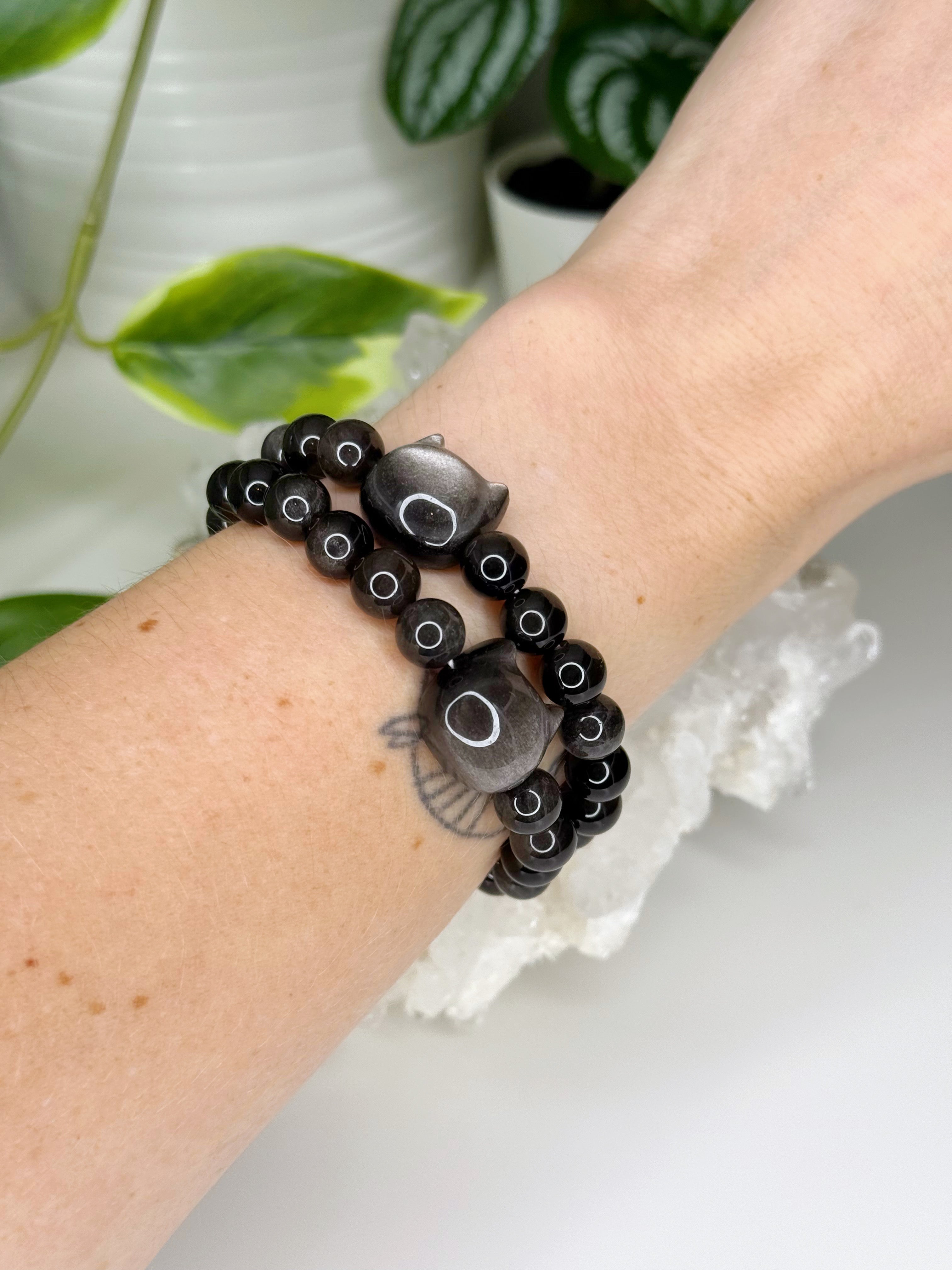SILVER SHEEN OBSIDIAN CAT 8mm - HANDMADE CRYSTAL BRACELET - 10 Dec Inventory, 8mm, black, bracelet, cat, cat head, crystal bracelet, handmade bracelet, jewelry, June 2025 inventory check, kitty, memento mori, memento mori collection, moon, new critter drop, obsidian, Scorpio Season, silver sheen obsidian, Wearable - The Mineral Maven