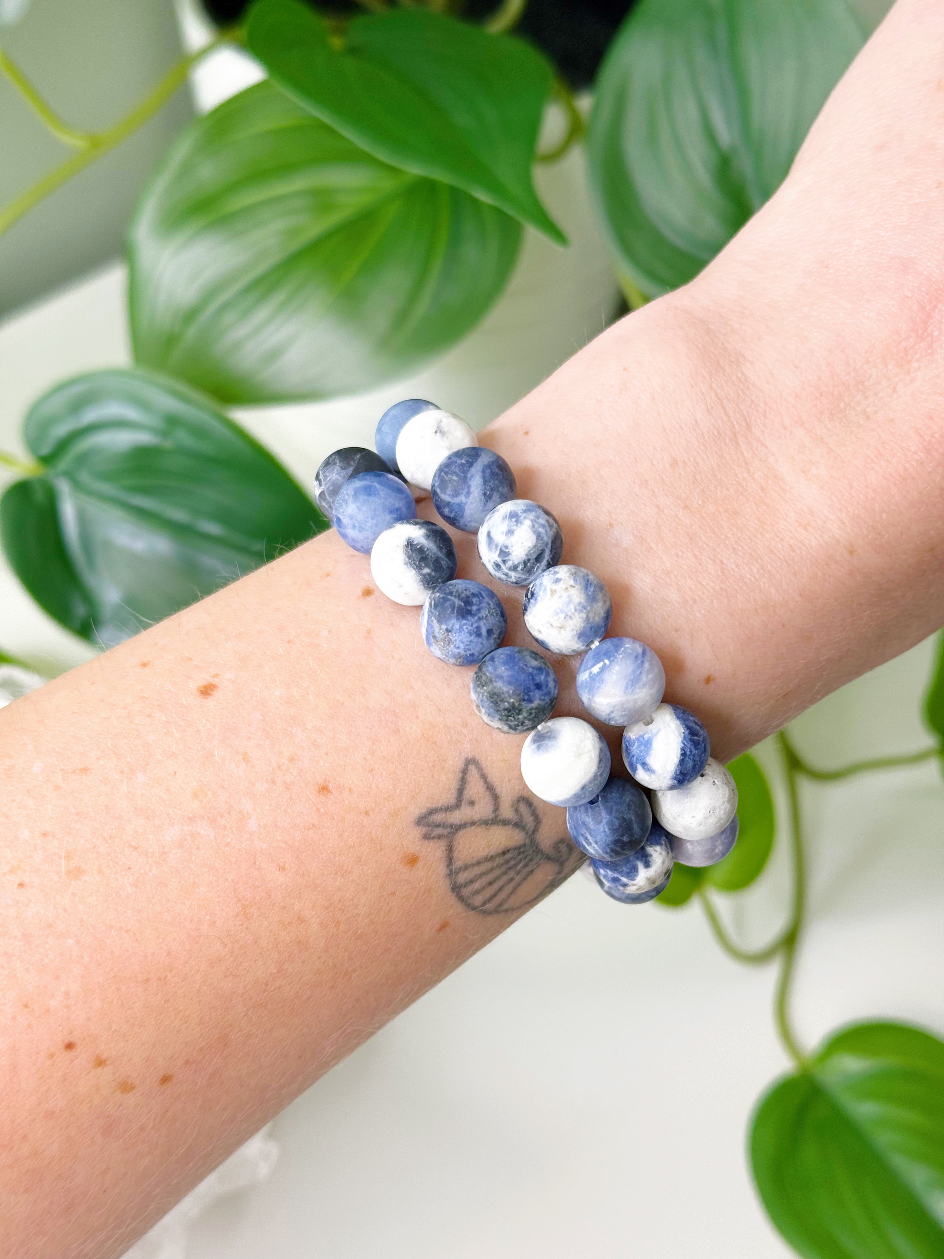 SODALITE (MATTE) 10mm - HANDMADE CRYSTAL BRACELET - 10mm, air, Aquarius, blue, bracelet, crystal bracelet, handmade bracelet, jewelry, market bracelet, matte, mercury retrograde, pisces, sagittarius, sodalite, taurus, virgo, Wearable, winter solstice - The Mineral Maven