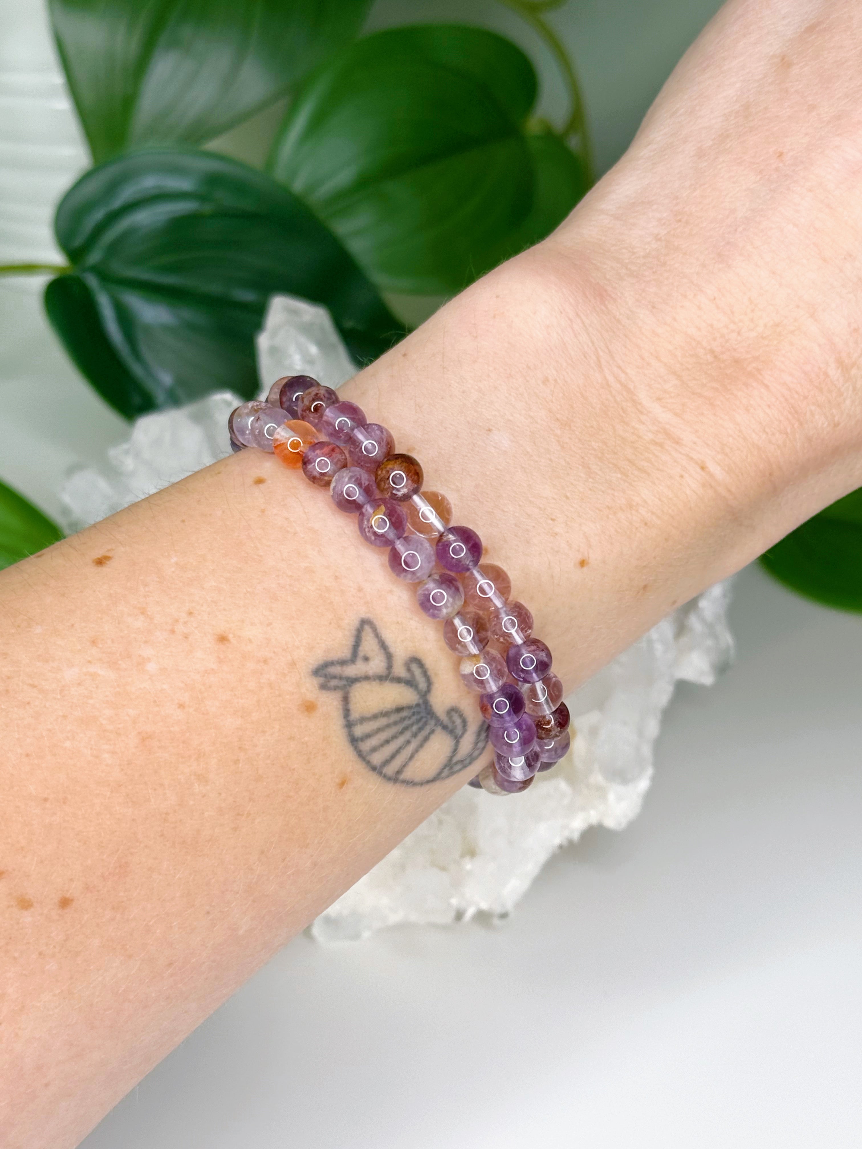 SUPER 7 6mm - HANDMADE CRYSTAL BRACELET - 6mm, 6th anniversary, bracelet, crystal bracelet, emotional support, handmade bracelet, jewelry, market bracelet, purple, Scorpio Season, super 7, Wearable - The Mineral Maven