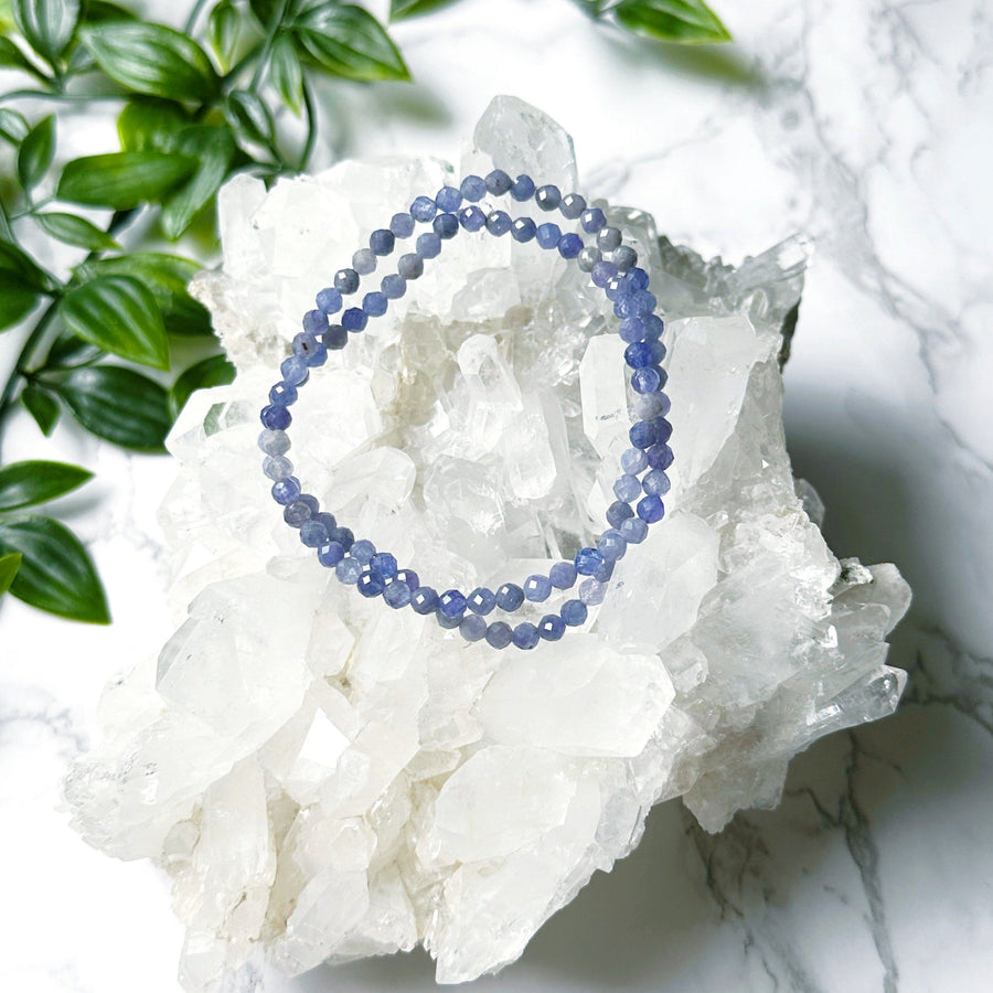 TANZANITE (FACETED) 4mm - HANDMADE CRYSTAL BRACELET - 4mm, blue, bracelet, crystal bracelet, faceted, gemini, gemini stack, handmade bracelet, jewelry, market bracelet, mini, mini update, purple, recently added, restocked, tanzanite, Wearable - The Mineral Maven