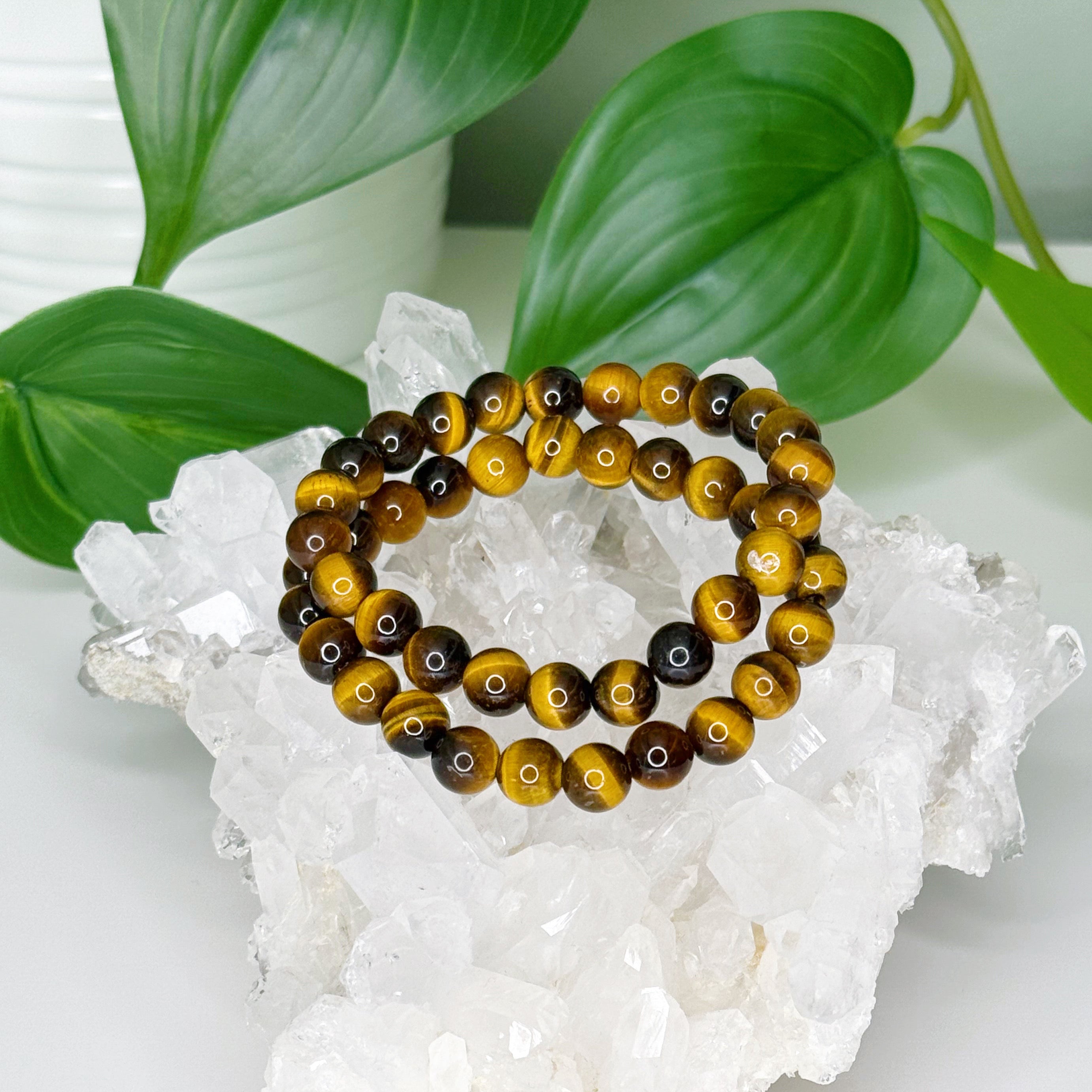 TIGER’S EYE 8mm - HANDMADE CRYSTAL BRACELET - 8mm, bracelet, capricorn, career, crystal bracelet, crystals for beginners, earth, fire, handmade bracelet, jewelry, Leo, market bracelet, summerween collection, sun, tiger’s eye, Wearable - The Mineral Maven
