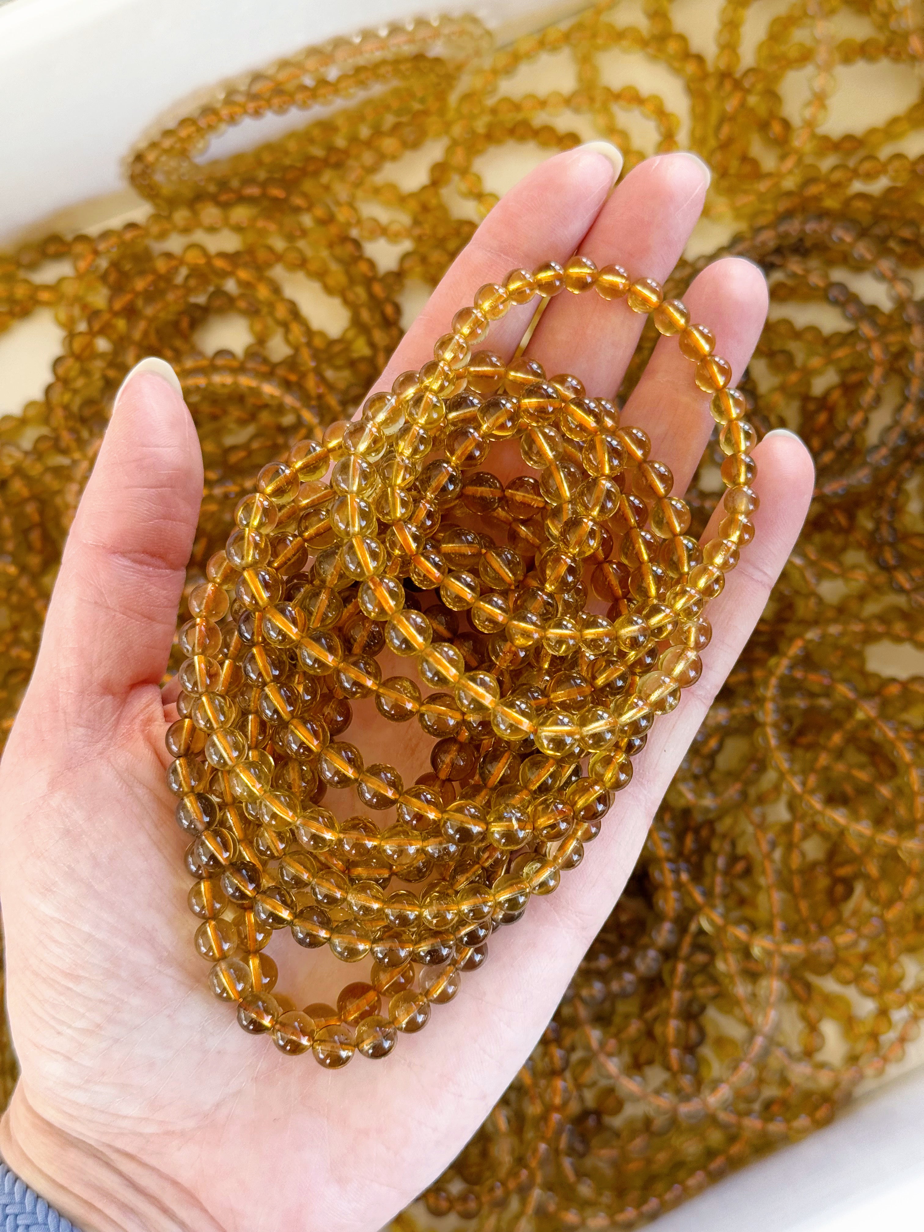 ZAMBIAN CITRINE 6mm - PRE-MADE CRYSTAL BRACELET - 6mm, bracelet, citrine, crystal bracelet, crystals for beginners, good luck + abundance, handmade bracelet, jewelry, June 2025 inventory check, leo, natural citrine, smoky citrine, tucson mini drop, Wearable, yellow, zambian citrine - The Mineral Maven